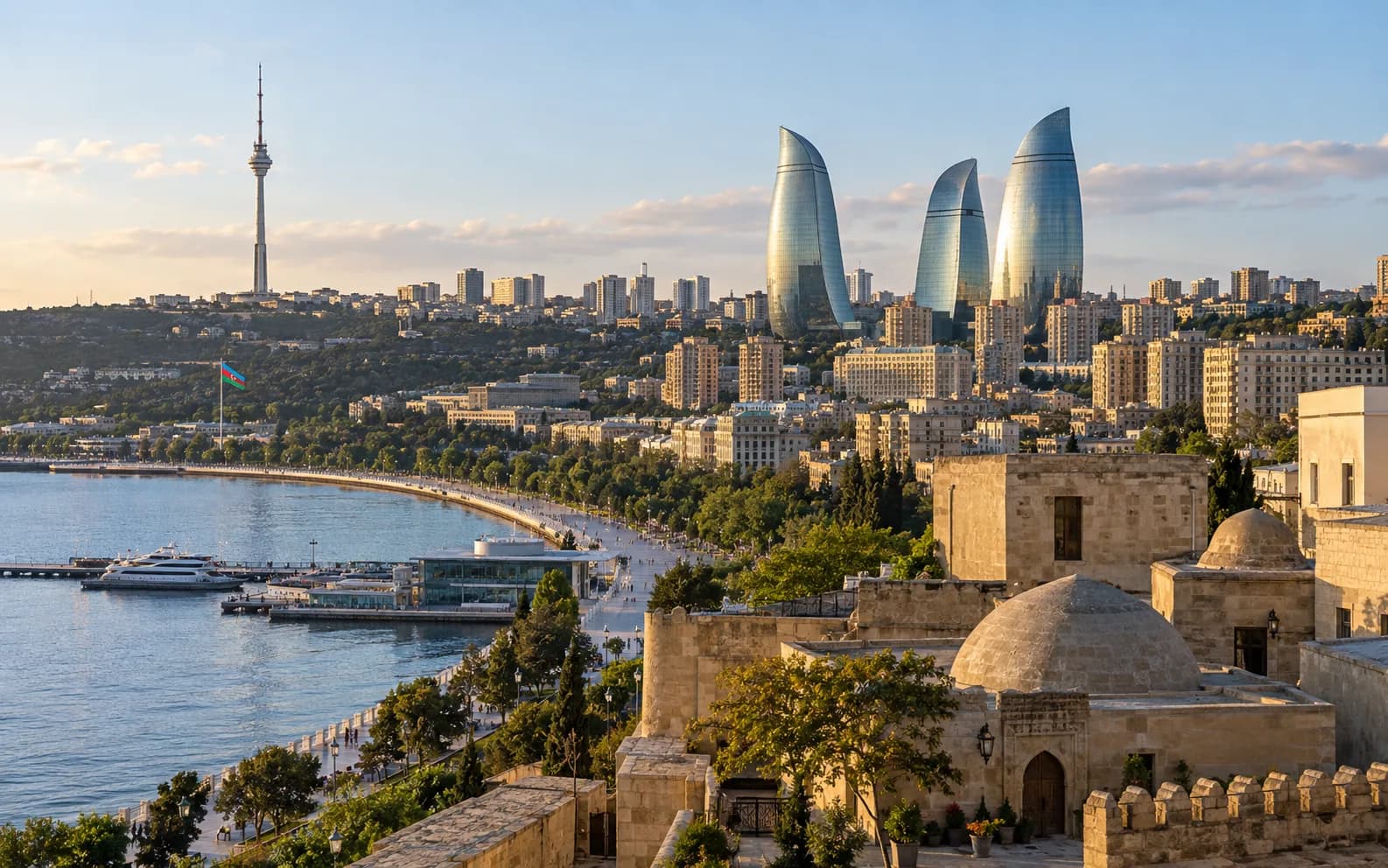 Baku skyline with the Flame Towers, historic stone architecture and Caspian waterfront