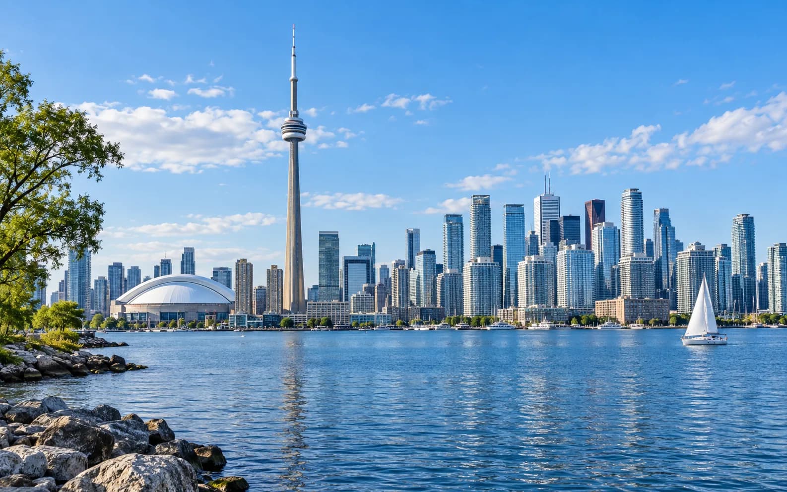 Toronto skyline and CN Tower beside Lake Ontario in Canada