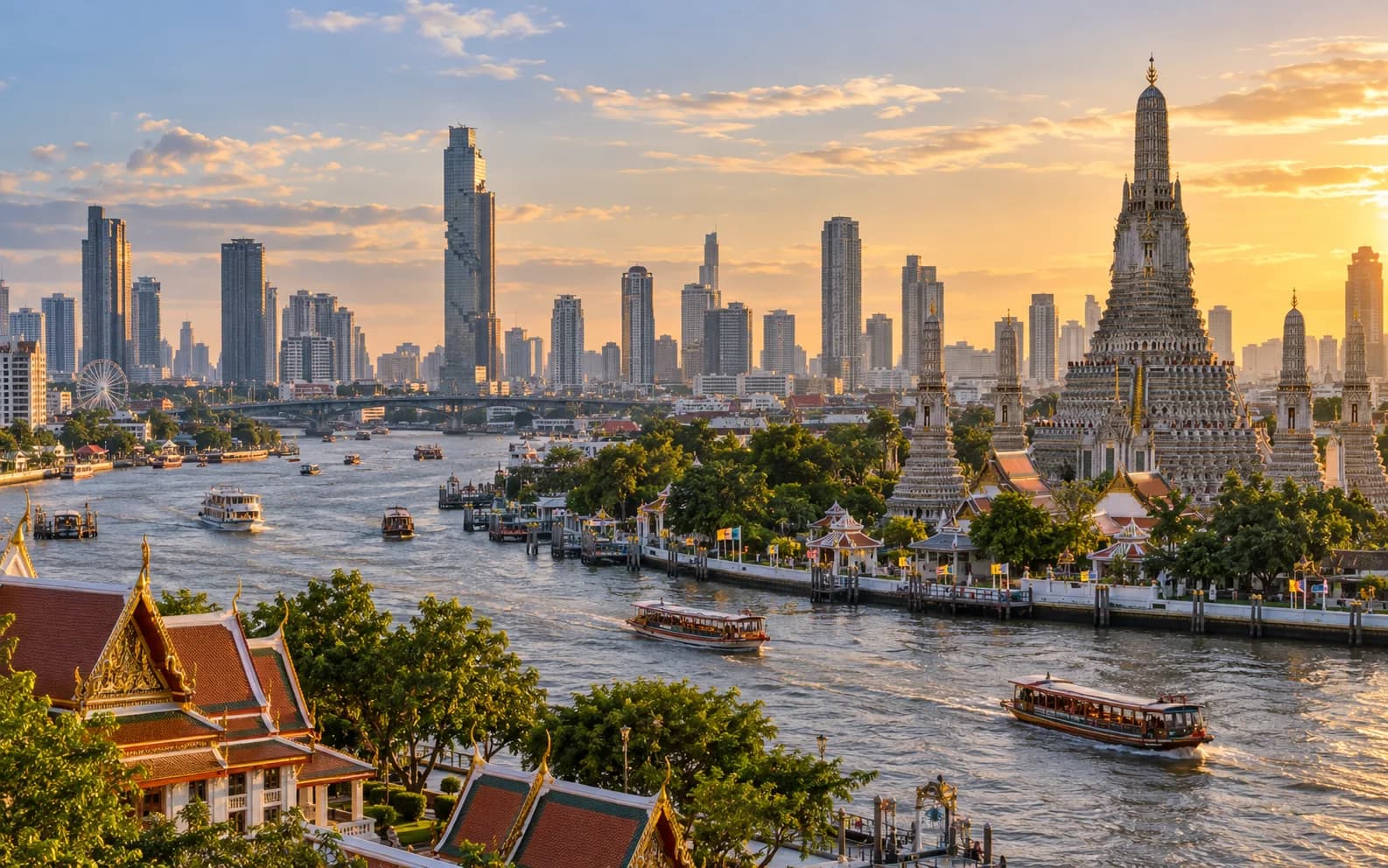 Bangkok skyline, Thai temples and boats along the Chao Phraya River